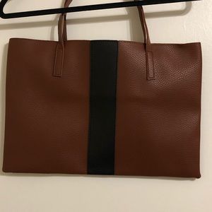 Brown bag with black stripe
